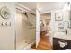 Clean bathroom with glass enclosed shower, vanity, and tile floors at 1933 Chestnut St, Fort Lupton, CO 80621
