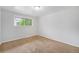 Cozy bedroom with carpeted floor and lots of natural light at 12063 E Arizona Dr, Aurora, CO 80012