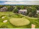 Beautiful home with views of the golf course and mountains in the distance at 32 Glenmoor Dr, Englewood, CO 80113