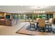 Spacious living space combining a dining area, living room, and seamless indoor-outdoor flow at 32 Glenmoor Dr, Englewood, CO 80113