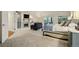 A spacious main bedroom suite with a fireplace, sitting area, and balcony access at 32 Glenmoor Dr, Englewood, CO 80113