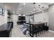 Finished basement offers a cozy seating area with a wet bar and a modern entertainment center at 7106 Cerney Cir, Castle Pines, CO 80108