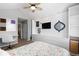 Well-lit bedroom featuring a vaulted ceiling, ample closet space, and a ceiling fan at 7106 Cerney Cir, Castle Pines, CO 80108