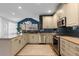 Well-equipped kitchen featuring stainless steel appliances, modern cabinetry, a view into the dining area and eat-in counter at 7106 Cerney Cir, Castle Pines, CO 80108