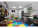 Finished basement designed as a pet-friendly area with colorful flooring and ample storage at 7106 Cerney Cir, Castle Pines, CO 80108
