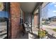 Inviting front porch with comfortable seating, perfect for relaxing and enjoying the neighborhood views at 7106 Cerney Cir, Castle Pines, CO 80108
