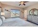 Bright bedroom features a large window, neutral palette, and decorative accents, creating a comfortable and inviting space at 535 Elmhurst Way # A, Highlands Ranch, CO 80129