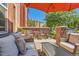 Outdoor patio with comfortable seating, offering a relaxing space for entertaining or enjoying the view at 535 Elmhurst Way # A, Highlands Ranch, CO 80129