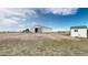 Spacious barn with open doors on a large lot at 32350 E 137Th Way, Brighton, CO 80603