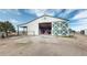 Spacious barn with an open door, showcasing its size and functionality at 32350 E 137Th Way, Brighton, CO 80603