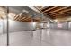 Spacious unfinished basement showcasing exposed ceiling, concrete floors, and potential for future development at 32350 E 137Th Way, Brighton, CO 80603