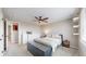 A cozy bedroom featuring a ceiling fan and neutral decor creating a serene and inviting atmosphere at 32350 E 137Th Way, Brighton, CO 80603