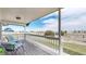 Inviting porch area with comfortable seating and scenic views at 32350 E 137Th Way, Brighton, CO 80603