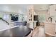 Open floor plan featuring kitchen, dining area and living room with lots of natural light at 4600 Dillon St, Denver, CO 80239