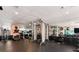 Well-equipped gym featuring treadmills, weight machines, and free weights for residents at 2 Adams St # 1504, Denver, CO 80206