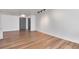 Living room features wood-look floors, track lighting, and neutral paint at 2 Adams St # 1504, Denver, CO 80206