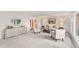 Spacious living room with abundant seating, stylish decor, and bright, airy ambiance at 10 Martin Ln, Cherry Hills Village, CO 80113