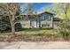 Charming home with a well-maintained lawn and mature trees, offering great curb appeal at 12829 E Oregon Dr, Aurora, CO 80012