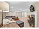 Cozy finished basement with a comfortable sectional sofa, fireplace, and entertainment area for relaxation at 4262 E Fremont Pl, Centennial, CO 80122