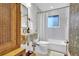 Charming bathroom features a marble sink, elegant fixtures, and decorative wallpaper, adding a touch of sophistication at 4262 E Fremont Pl, Centennial, CO 80122