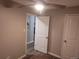 Neutral bedroom showcases wood floors, ceiling fan, and convenient closet and door placement at 9650 Huron St # 5, Thornton, CO 80260