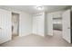 Bright bedroom featuring a closet and access to two other rooms at 512 County Road 136, Elizabeth, CO 80107