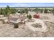 Aerial view of a lovely home with a striking red barn and ample land, perfect for serene country living at 512 County Road 136, Elizabeth, CO 80107