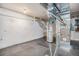 Utility basement featuring mechanical equipment and a white moisture barrier at 529 Uinta Way, Denver, CO 80230