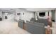 Finished home theater room features a large screen, tiered seating, and cinematic surround sound at 529 Uinta Way, Denver, CO 80230