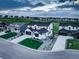 An aerial view of a white modern farmhouse showing its location in a picturesque neighborhood at 39405 Stockton Cir, Elizabeth, CO 80107