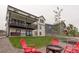 Backyard with a patio, fire pit, seating and hot tub for relaxation and entertainment at 39405 Stockton Cir, Elizabeth, CO 80107