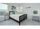 Bright bedroom featuring large window, modern vanity, and stylish decorations at 39405 Stockton Cir, Elizabeth, CO 80107