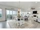 Open dining room with large windows and sliding glass door at 39405 Stockton Cir, Elizabeth, CO 80107