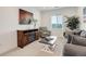Comfortable living room with fireplace and view from the window at 39405 Stockton Cir, Elizabeth, CO 80107