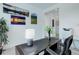 Modern home office with desk, artwork, and natural light at 39405 Stockton Cir, Elizabeth, CO 80107