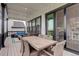Covered patio with dining table, chairs, and comfortable seating area with scenic views at 39405 Stockton Cir, Elizabeth, CO 80107