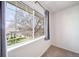 Bright bedroom featuring a large window with a view of the well-maintained front yard at 3000 E 112Th Ave # 56, Northglenn, CO 80233