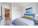 A styled bedroom features a bed and closet at 3000 E 112Th Ave # 56, Northglenn, CO 80233