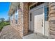Charming front entrance with beautiful stone detailing and inviting curb appeal at 3000 E 112Th Ave # 56, Northglenn, CO 80233