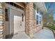 Inviting front entrance featuring stone accents and well-maintained landscaping at 3000 E 112Th Ave # 56, Northglenn, CO 80233