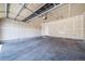 Clean, unfinished garage with ample space and potential for customization at 3000 E 112Th Ave # 56, Northglenn, CO 80233
