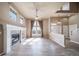 Spacious living room featuring fireplace, wood floors, and plentiful natural light at 3000 E 112Th Ave # 56, Northglenn, CO 80233