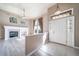 Bright living room featuring a fireplace, tile floors, and many windows at 3000 E 112Th Ave # 56, Northglenn, CO 80233