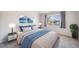 Inviting main bedroom with stylish decor and a window offering a serene view at 3000 E 112Th Ave # 56, Northglenn, CO 80233