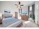 Serene bedroom with ample natural light, stylish décor, and a neutral color palette at 3000 E 112Th Ave # 56, Northglenn, CO 80233