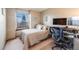 Bedroom with a view and a desk near the window; a comfortable and functional space at 5689 S Youngfield Way, Littleton, CO 80127