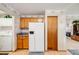 Bright kitchen with stainless steel refrigerator at 5689 S Youngfield Way, Littleton, CO 80127