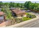 Bird's eye view of the home's yard showing mature trees and landscaping at 5703 Field St, Arvada, CO 80002