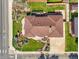 Aerial view of the home showcasing well-kept landscaping and a two-car driveway at 5703 Field St, Arvada, CO 80002