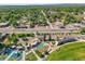 A well-equipped community park features a playground and splashpad near local businesses and parking at 5703 Field St, Arvada, CO 80002